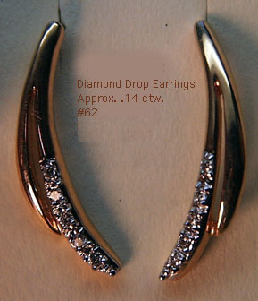 14 Karat Gold Diamond Drop Earrings - Trademark Jewelers