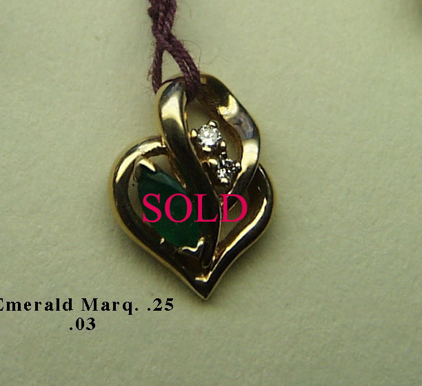 14 Karat Gold Emerald and Diamond Pendant - Trademark Jewelers