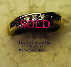 14 Karat Gold Blue Sapphire and Diamond Ring - Trademark Jewelers