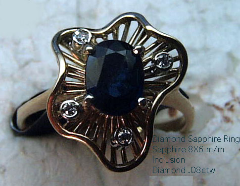 14 Karat Gold Blue Sapphire and Diamond Ring - Trademark Jewelers